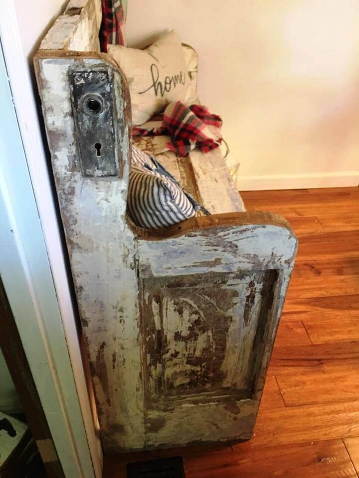 distressed mid century bench made of an old door
